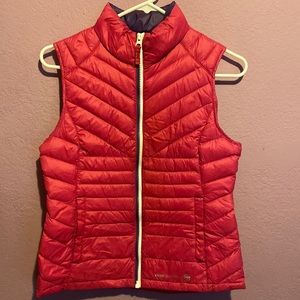 Sleeveless pink puffer jacket